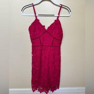 Pink cocktail dress with floral detail